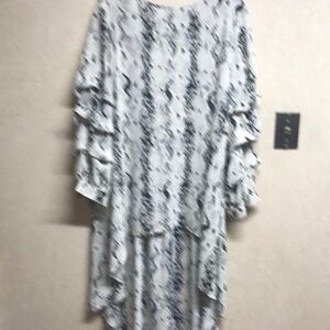 Not sure what this top is called long in back.ptp 23